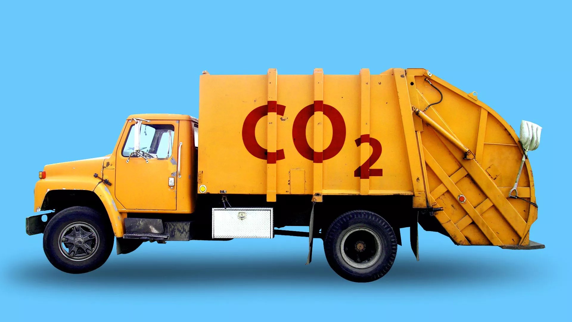 Yellow dump truck with CO2 written on its side